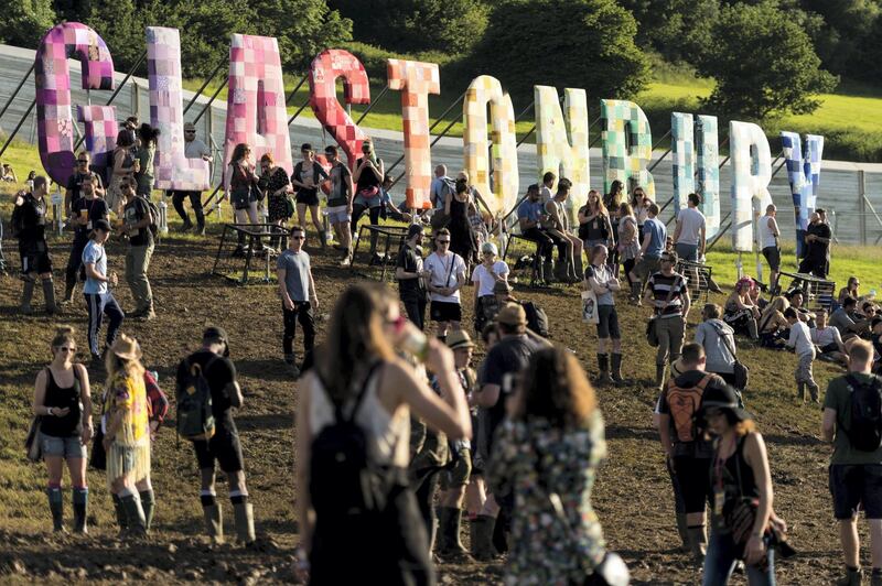 GLASTONBURY, ENGLAND - JUNE 22:  A general view of festival goers in the sunshine at the Glastonbury Festival at Worthy Farm, Pilton on June 22, 2016 in Glastonbury, England. Now its 46th year the festival is one largest music festivals in the world and this year features headline acts Muse, Adele and Coldplay. The Festival, which Michael Eavis started in 1970 when several hundred hippies paid just Â£1, now attracts more than 175,000 people.  (Photo by Ian Gavan/Getty Images)
