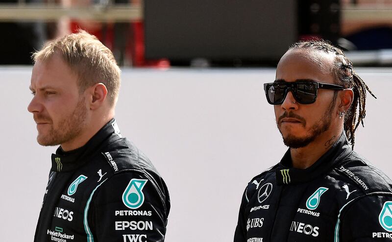Mercedes' drivers Valtteri Bottas and Lewis Hamilton during the first day of the Formula One pre-season testing at the Bahrain International Circuit in the city of Sakhir. AFP