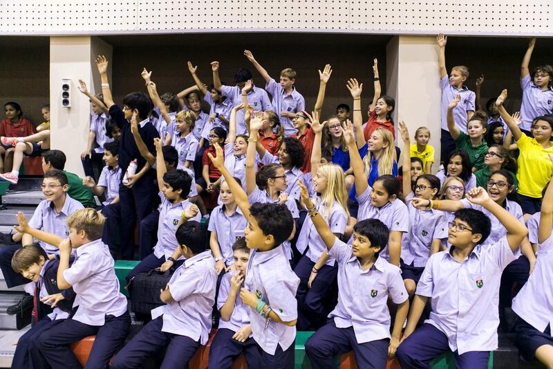 Pupils of Dubai International Academy react during the Harlem Globetrotters’ presentation at their school.  Reem Mohammed / The National