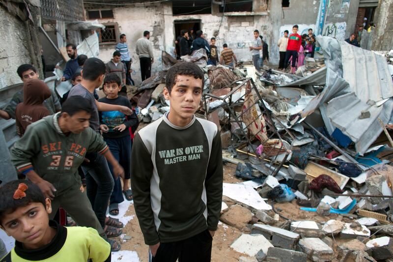 Palestinian Mustafa Hijaza,20, at the scene of his family's destroyed home in Beit Lahiya , Gaza November 23,2012 . Mustafa was wounded by shrapnel  when an Israeli shell hit the home killing two of his brothers and his father .(Photo by Heidi Levine/Sipa Press for The National)