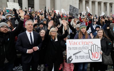 Robert F  Kennedy Jr, left, attends a 2019 protest opposing a bill to tighten measles, mumps and rubella vaccine requirements for school-aged children. AP 