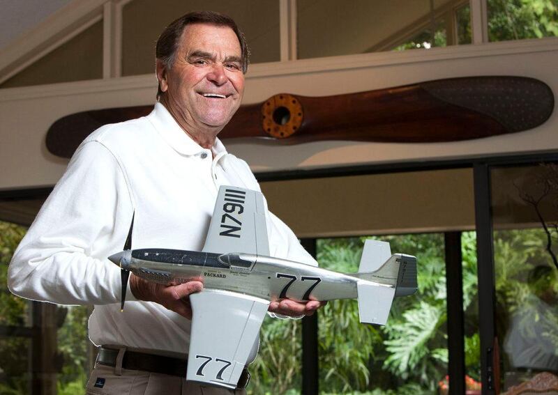 Jimmy Leeward  holds a scale model of his P-51 Mustang at his home Wednesday afternoon, Oct. 27, 2010 in Ocala, FL. Leeward died when he crashed the plane during the Reno Air Races in Reno Nevada Friday Sept. 16, 2011. (AP Photo/Doug Engle - Star-Banner) *** Local Caption ***  Air Show Crash.JPEG-0ed28.jpg