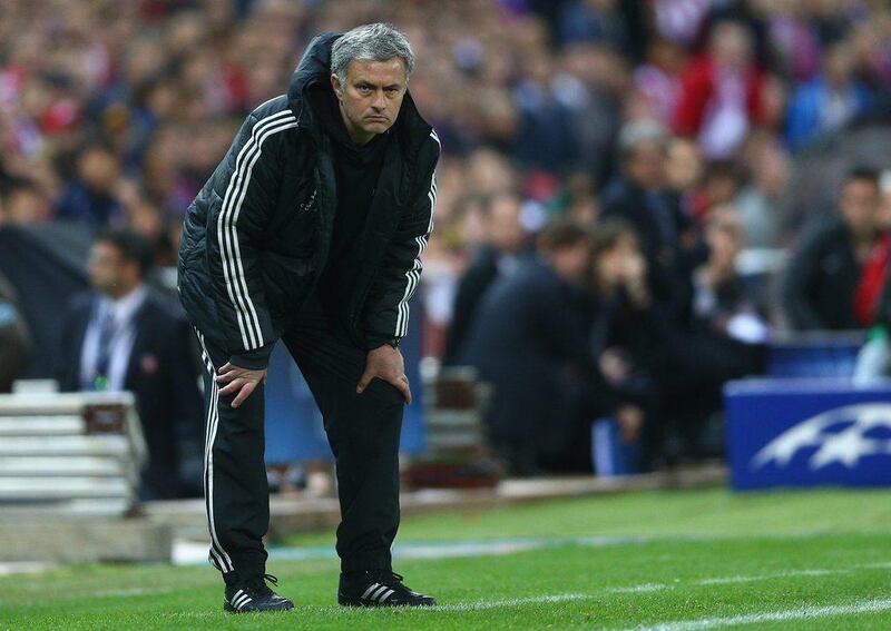 Manager Jose Mourinho of Chelsea looks on from the dug out during the Champions League semi-final first leg match against Atletico Madrid on Tuesday. Paul Gilham / Getty Images / April 22, 2014 