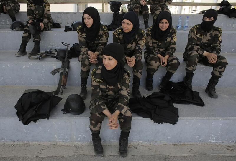 The 22 future commandos are trailblazers in a still largely male-dominated society, set to become the first female members of the Presidential Guards, a Palestinian elite force of 2,600 men. Ammar Awad / Reuters