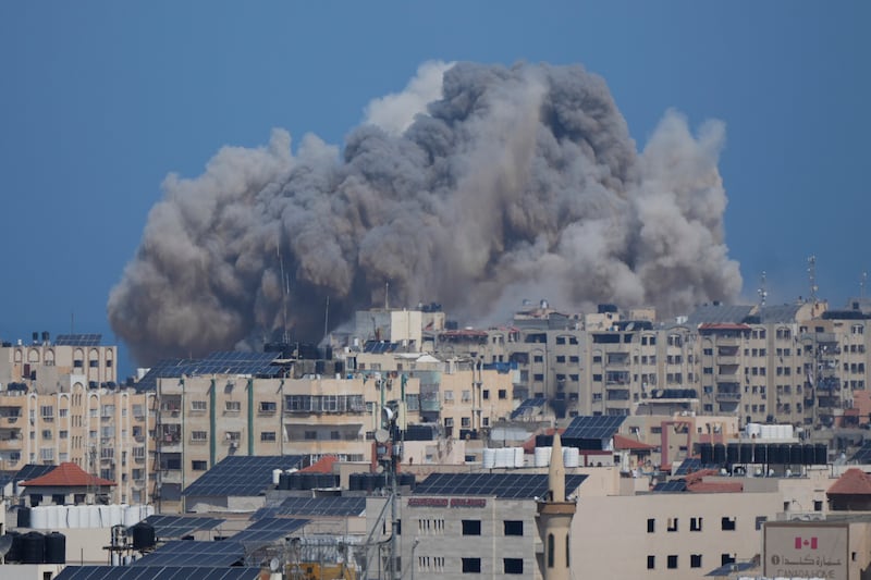 Smoke rises following an Israeli airstrike in Gaza City. AP