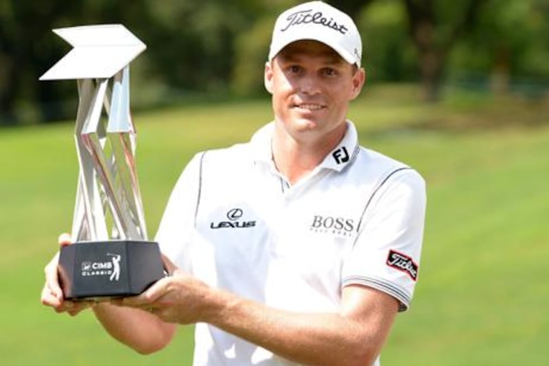 Nick Watney with his trophy for winning the CIMB Classic in Malaysia