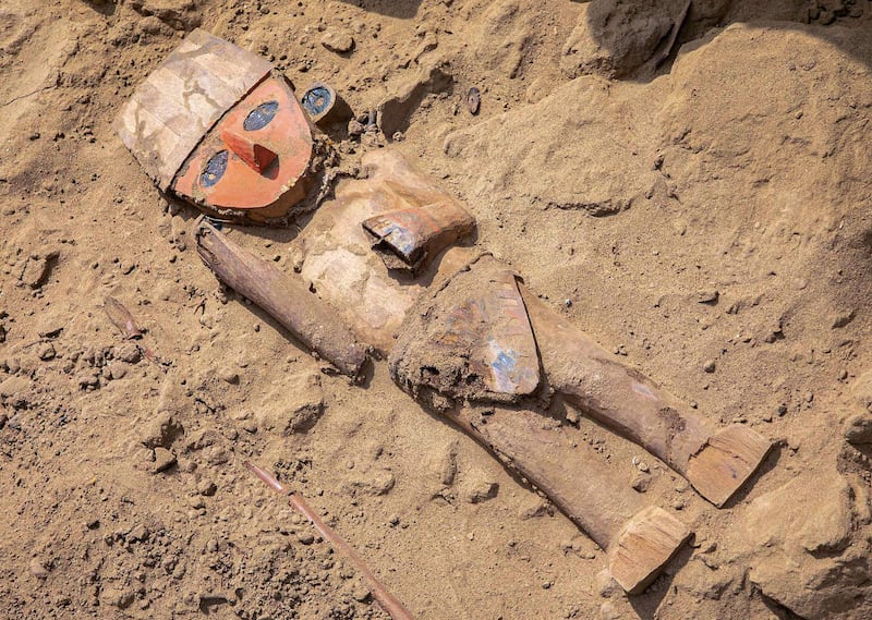 Archaeologists dated a wooden figure discovered at Chan Chan in northern Peru to the Chimu period of 900AD to 1450AD. AFP