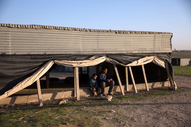 Salah El Dabashas,15, with his five year -old cousin named Omar as they sit at a structure for gatherings at the unrecognized village of al-Poraa near the city of Arad in the Negev Desert on February 2,2018. 
A future giant phosphate mine thats estimated to hold 65 million tons of phosphate, by theIsrael Chemicals subsidiary Rotem Amfert . Israel's Knesset is scheduled to discuss the plan which a committee of ministers have already approved, despite that the area is populated by Bedouins that fear it  will cause serious health risks and most likely evict them from their homes. (Photo by Heidi Levine for The National).
