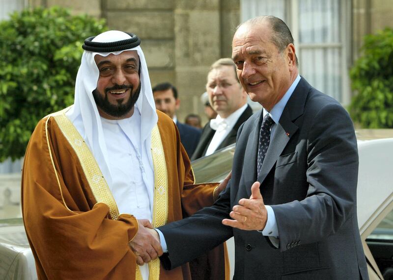 French President Jacques Chirac receives Abu Dhabi Crown Prince Khalifa Ben Zayed (L)  at the Elysée palace, 14 June 2003 in Paris. (Photo by PATRICK KOVARIK / AFP)