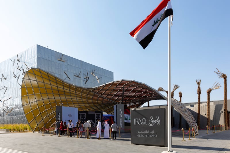 Visitors outside the Iraq Pavilion, Expo 2020 Dubai. David Koriako/Expo 2020 Dubai