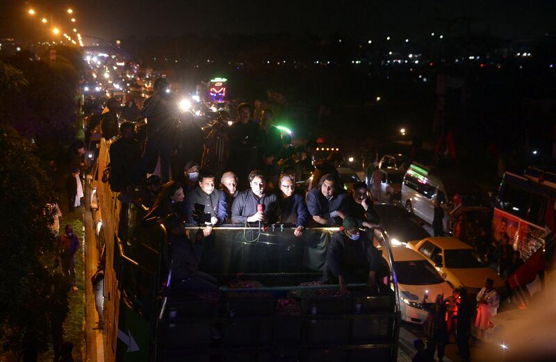 PPP leader Mr Bhutto Zardari, centre, at the rally. The opposition needs a simple majority of 172 and says it requires only 11 more votes to force Mr Khan out. EPA