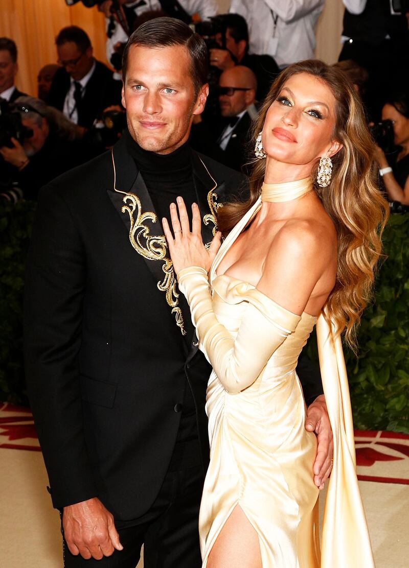 epa08300782 (FILE) - New England Patriots quarterback Tom Brady (L) and his wife, Brazilian model Giselle Bundchen (R) arrive on the red carpet for the Metropolitan Museum of Art Costume Institute's benefit gala in New York, USA, 07 May 2018 (re-issued on 17 March 2020). Tom Brady announced on 17 March 2020 that he will leave the New England Patriots.  EPA/JUSTIN LANE