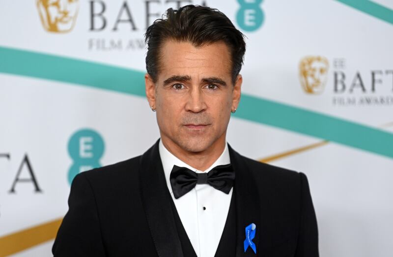 Irish actor Colin Farrell wears his #WithRefugees blue ribbon at the Baftas. EPA