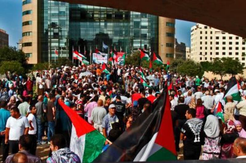 More than 2,000 demonstrators hold up the Palestinian flag as they gathered outside the United Nations' offices in Beirut on September 20, 2011, in a show of support for a Palestinian bid to secure full UN membership. AFP PHOTO ANWAR AMRO

 *** Local Caption ***  872085-01-08.jpg
