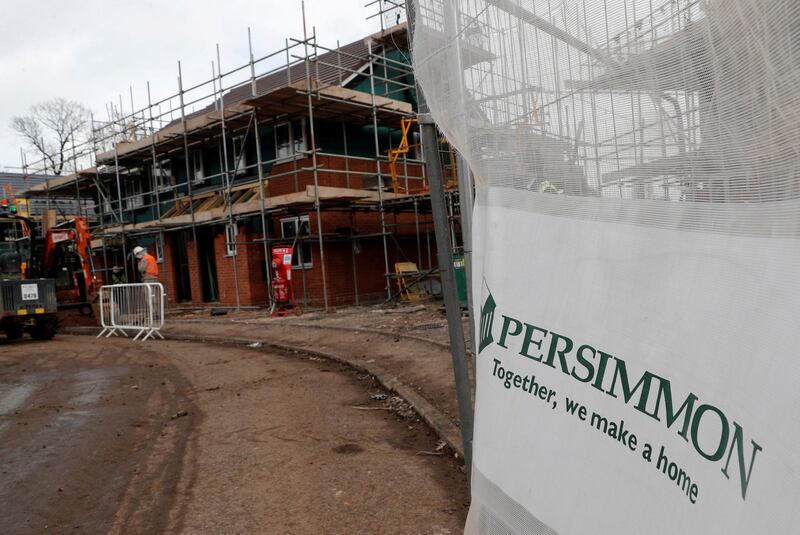 FILE PHOTO: Builders construct modular Space4 homes on a Persimmon development in Coventry, February 22, 2017. Picture taken February 22, 2017. To match Insight BRITAIN-EU/CONSTRUCTION REUTERS/Darren Staples/File Photo