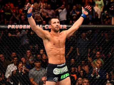 Luke Rockhold celebrates defeating Lyoto Machida of Brazil at the UFC Fight Night event at Prudential Center on April 18, 2015, in Newark, New Jersey. Getty Images