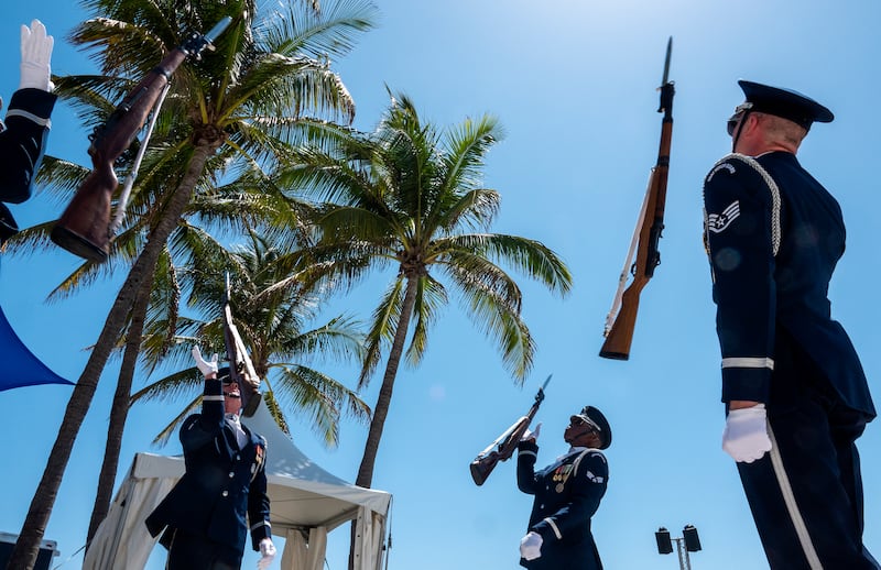The US Air Force Honour Guard drill team performs in Ocean Drive during the Memorial Day weekend in Miami Beach, Florida. EPA