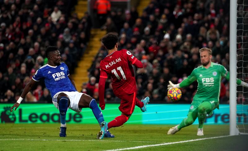 Liverpool's Mohamed Salah sees his shot saved by Leicester goalkeeper Kasper Schmeichel. PA