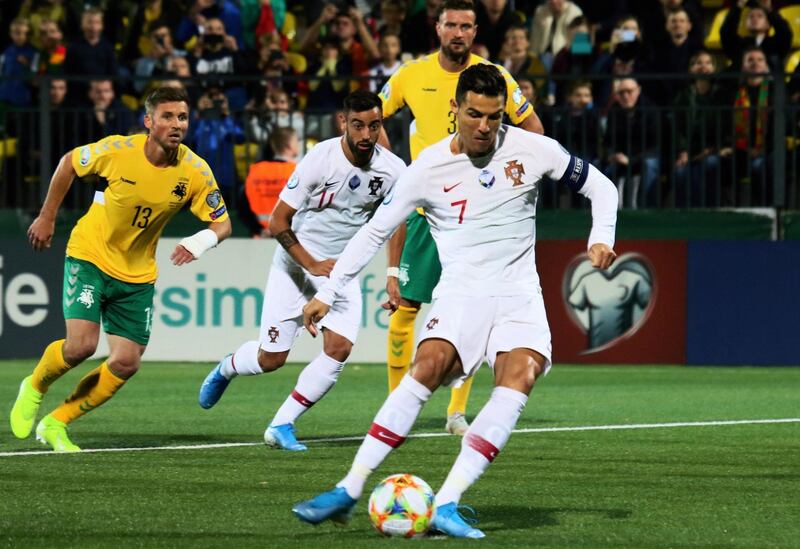 Portugal forward Cristiano Ronaldo scores the opening goal from the penalty spot during the Euro 2020 Group B match against Lithuania in Vilnius. Portugal ran out 5-1 winners. AFP