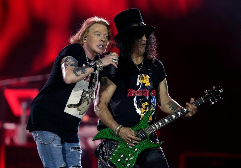 Axl Rose and Slash, lead singer and lead guitarist of U.S. rock band Guns N' Roses, perform during their "Not in This Lifetime... Tour" at the du Arena in Abu Dhabi, United Arab Emirates November 25, 2018. REUTERS/Christopher Pike