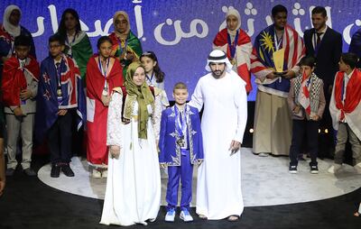 Sheikh Hamdan bin Mohammed, Crown Prince of Dubai, presents an award during the ceremony. Pawan Singh / The National