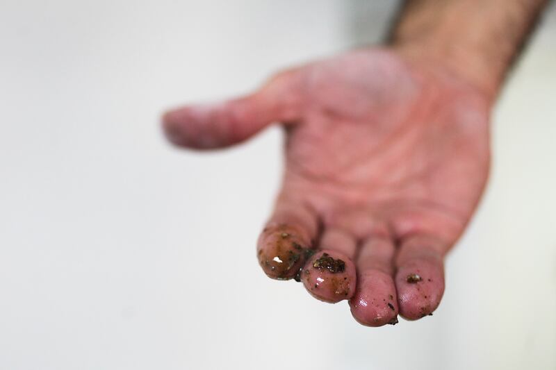 Abu Dhabi, UAE, February 19, 2015:

Stephen M. Curbelo has brought his expertise on clean air management to the UAE by way of Brooklyn General Maintenance. The New York native hopes to help everyone breathe more easily by making sure their AC units are up to par with international standards.  

This "slime" as he put it, is what collects in a clean duct. Dirty ducts are filled with many many more gruesome things. 
 

Lee Hoagland/The National *** Local Caption ***  LH0219_BROOKLYN_GENERAL_MAINTENANCE_0007.JPG