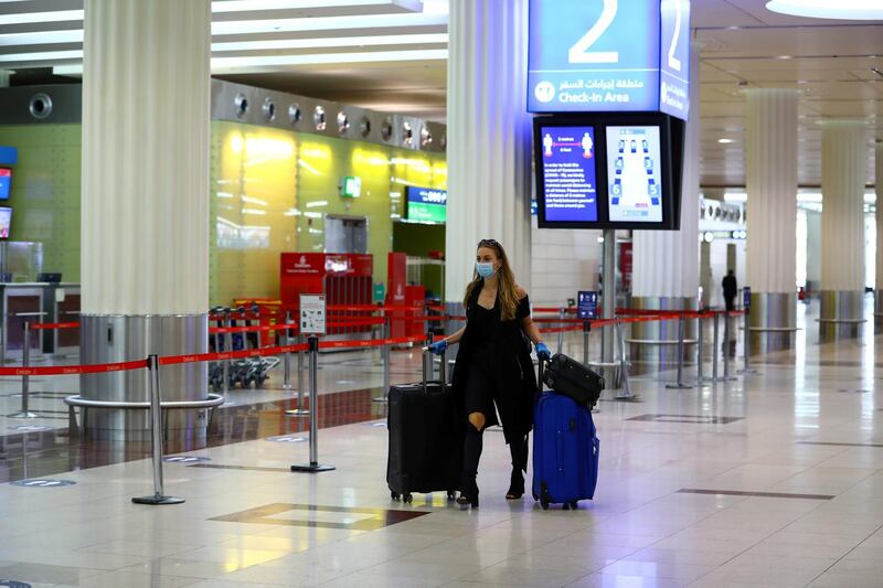 A passenger walks through Dubai International Airport on April 27, 2020, when repatriation flights only were running. Reuters