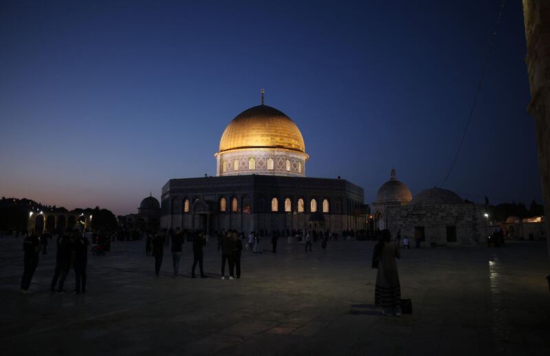 The Dome of the Rock at dawn on Eid Al Fitr, which marks the end of the fasting month of Ramadan. Several nights of clashes between Palestinian protesters and Israeli police, particularly around the Al Aqsa mosque, spiralled this week into a barrage of rocket fire from Gaza and deadly Israeli air strikes in retaliation. AFP