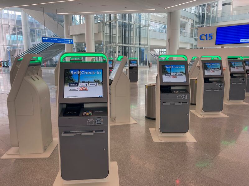 Check-in kiosks and a robotic baggage system speed up processes at the new Florida hub. AP 
