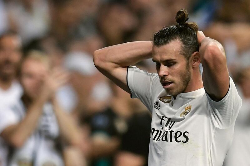 Real Madrid's Welsh forward Gareth Bale reacts during the Spanish league football match between Real Madrid CF and Club Atletico de Madrid at the Santiago Bernabeu stadium in Madrid on September 29, 2018. / AFP / OSCAR DEL POZO
