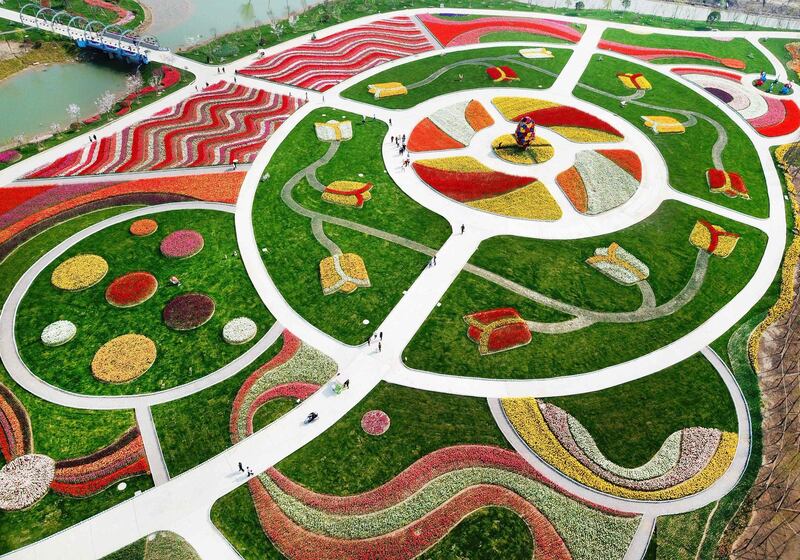 An aerial view of a park decorated with different coloured flowers in Nantong in China's Jiangsu province. AFP