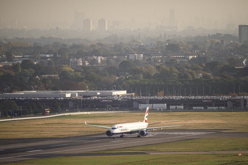 British Airways may slash its flights to and from Heathrow Airport, west London, if the airport increases charges, the airline's parent company said. PA