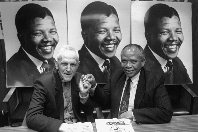 Mendi Msimang, chief representative of the African National Congress, meets Archbishop Trevor Huddleston (l), President of the Anti-Apartheid Movement, at a Press conference in London after the announcement of the release of Nelson Mandela, who is to be freed tomorrow.