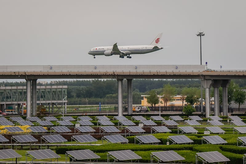 An Air China plane lands at Beijing Capital International Airport. The airport's code is PEK, based on the Chinese city's former name Peking. EPA