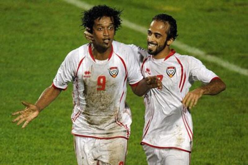 Mohamed Al Shehhi, left, Ali Al Wehalbi and the rest of teh UAE squad open their campaign against Kuwait on September 2.