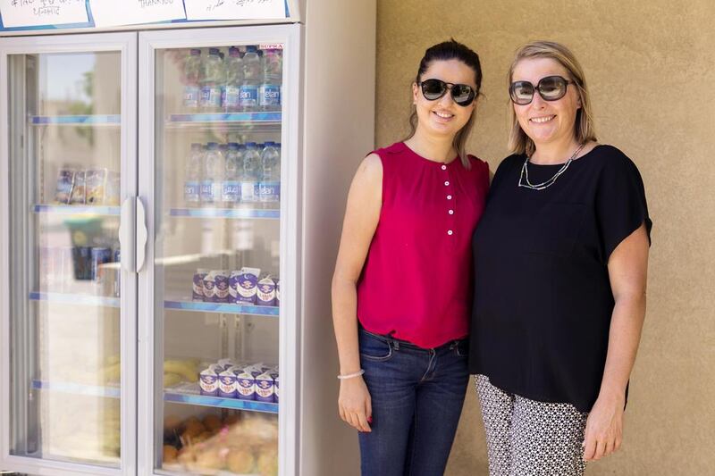 Sumayyah Sayed, left, and Anne Mulcahy help to organise the Ramadan Sharing Fridges initiative. Reem Mohammed / The National