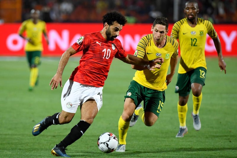 Mohamed Salah is marked by South Africa midfielder Dean Furman.  AFP