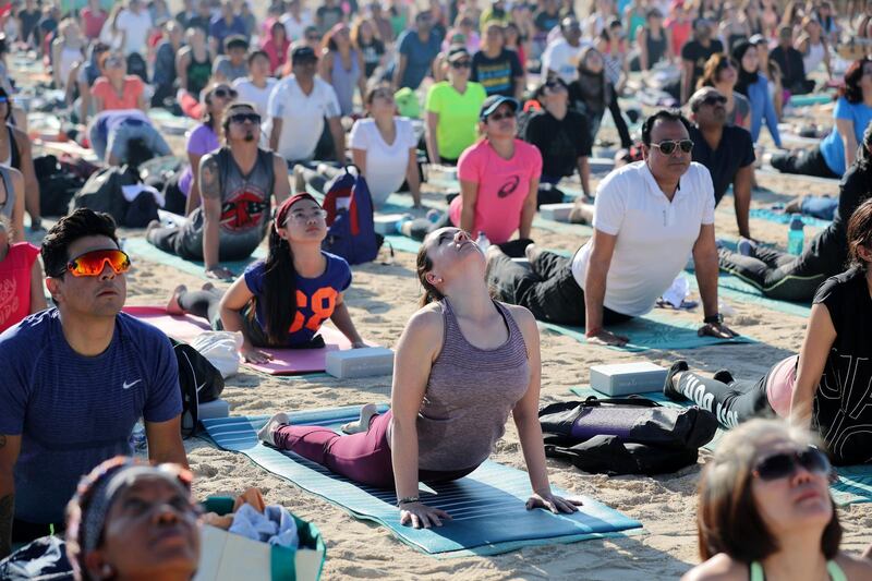 Dubai, United Arab Emirates - March 16th, 2018: A mass yoga session hosted by Bollywood actress Malaika Arora as part of X Yoga Dubai. Friday, March 16th, 2018. Kite Beach, Dubai. Chris Whiteoak / The National