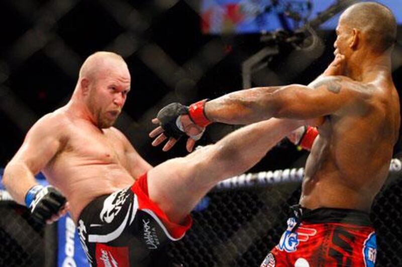 Hector Lombard eats a kick from Tim Boetsch on his UFC debut in Calgary.