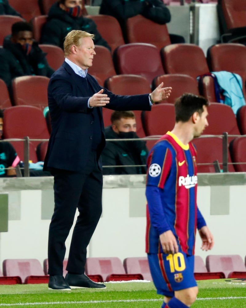 Barcelona coach Ronald Koeman gives directions to his players. AP