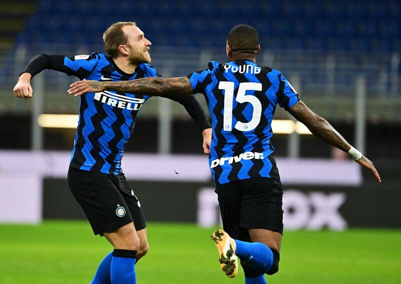 Inter Milan substitute Christian Eriksen, left, celebrates after scoring the winner. AFP