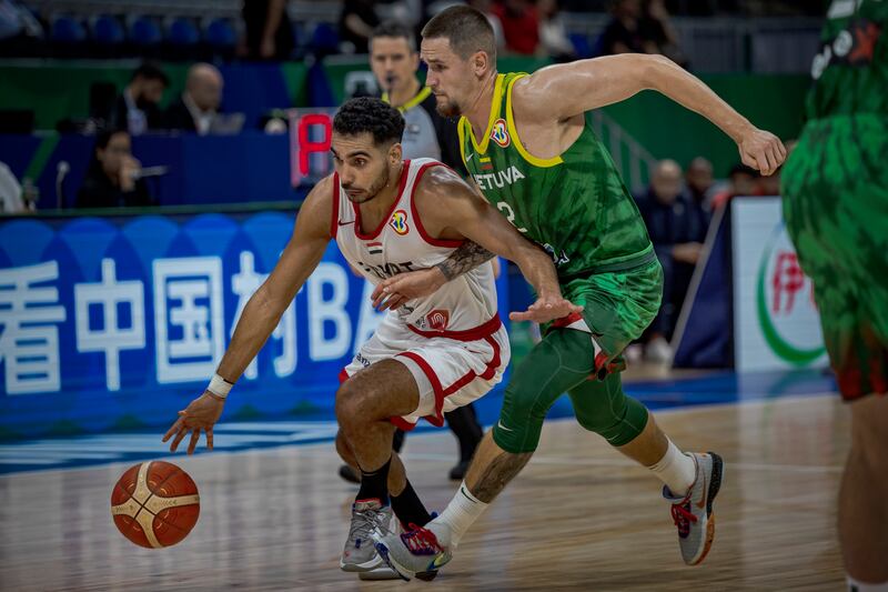 Ehab Amin of Egypt drives the ball against Margiris Normantas of Lithuania during their 2023 FIBA World Cup match in the Philippines. Getty