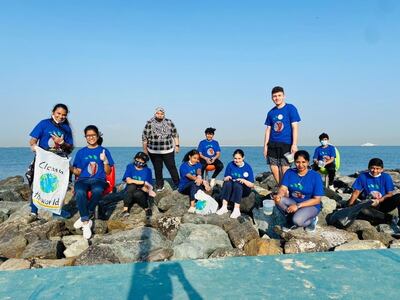 Pupils from Gems Legacy School collecting plastic waste during a beach clean-up. Photo; Gems Legacy School