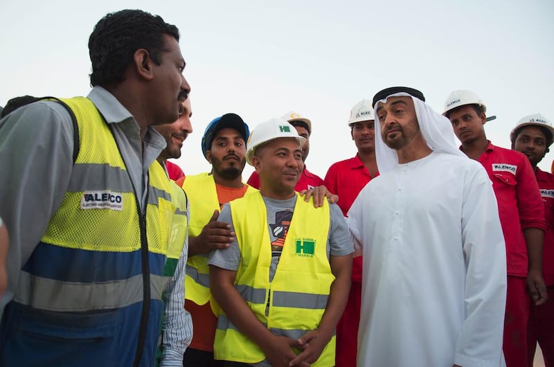 Sheikh Mohammed bin Zayed greets staff involved with the design and construction of Wahat Al Karama during a site visit on Wednesday. Hamad Al Kaabi for the Crown Prince Court — Abu Dhabi