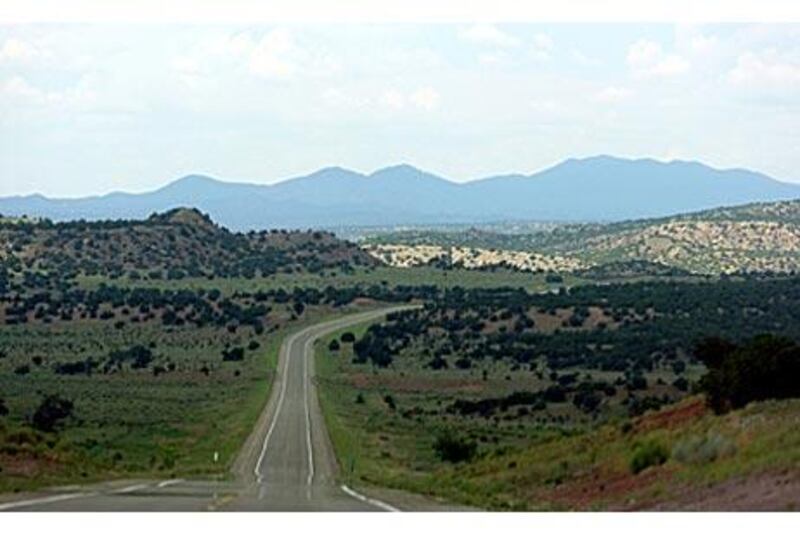 US Route 285 cuts through New Mexico and heads north towards Santa Fe before climbing up into the Rocky Mountains on to Denver, Colorado.