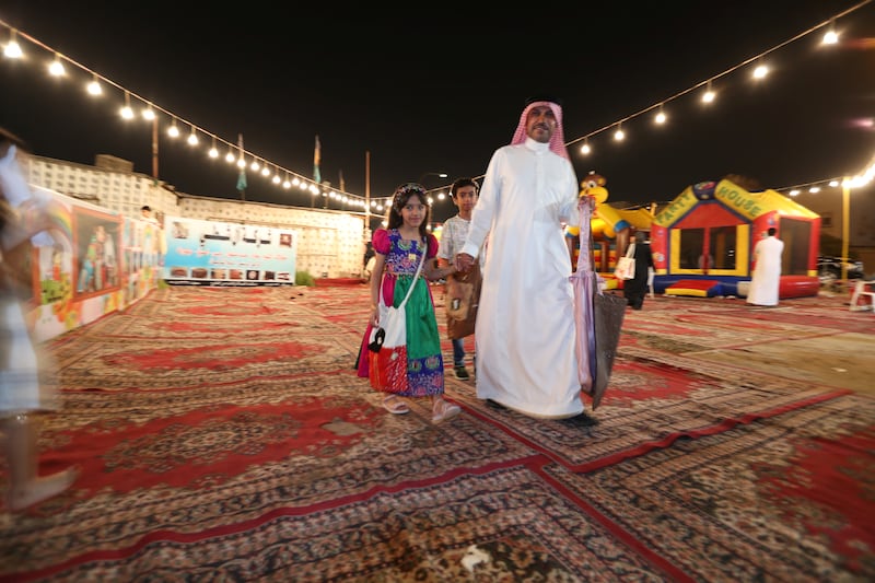 Children go house to house in Dammam, Saudi Arabia, asking for sweets on the 15th night of Ramadan. Reuters