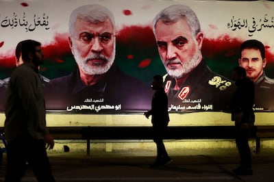 Iraqis participate in a candlelight vigil near Baghdad's International Airport on January 2, marking the fourth anniversary of the deaths of Qassem Suleimani and Abu Al Muhandis. AFP