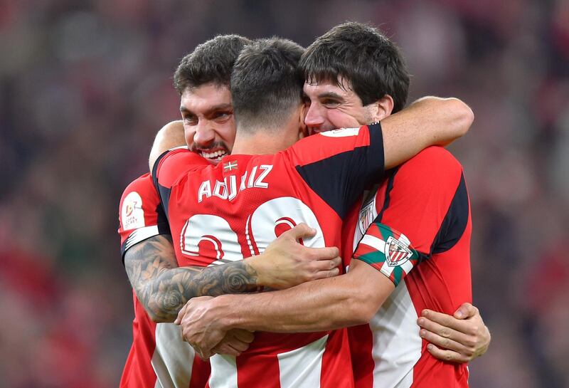 Athletic Bilbao players celebrate their win. AFP