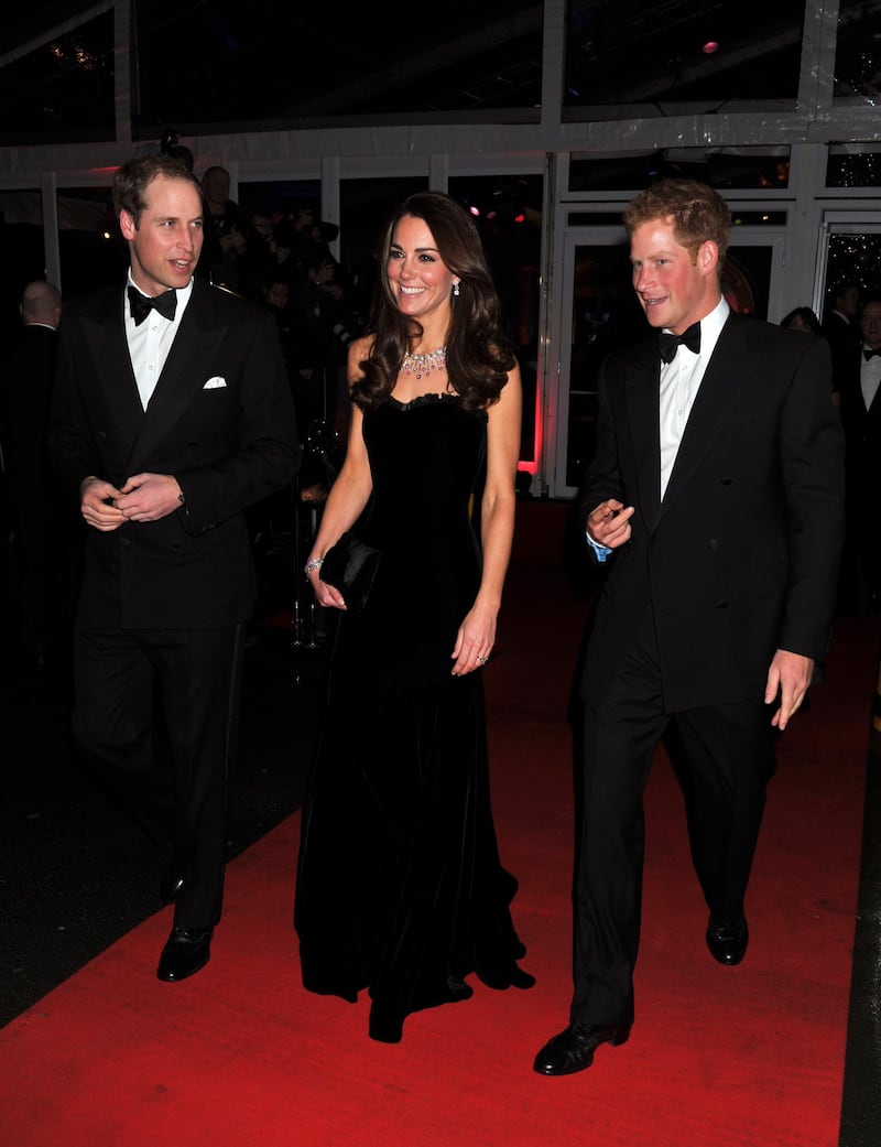LONDON, ENGLAND - DECEMBER 19: William, Duke of Cambridge, Catherine, Duchess of Cambridge and Prince Harry attend The Sun Military Awards at Imperial War Museum on December 19, 2011 in London, England. (Photo by John Stillwell- WPA Pool/Getty Images)