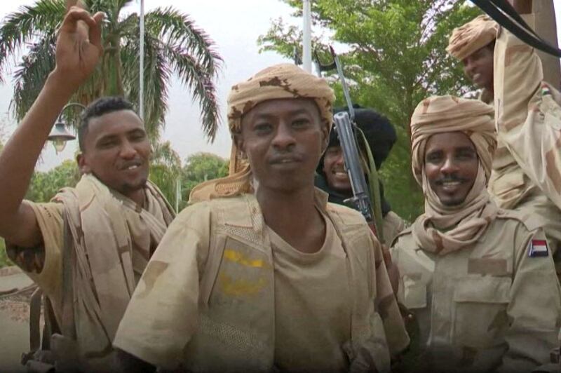 RSF fighters gather near the presidential palace in Khartoum on May 1. AFP